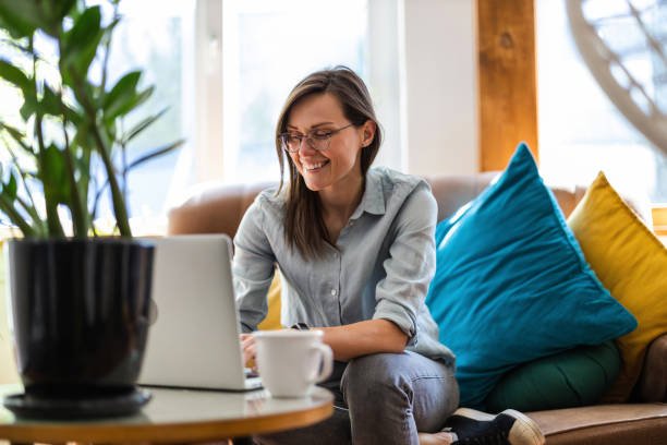 Young woman using a laptop at home